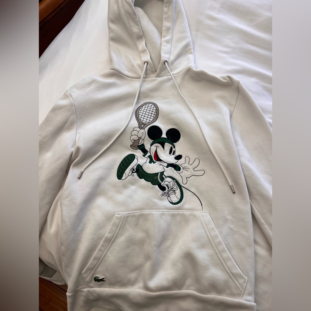 White Mickey Tennis Graphic Hoodie by Lacoste. Super cute